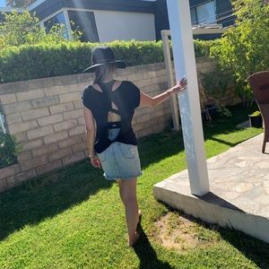 Silver sequin heart shaped shirt with open back.